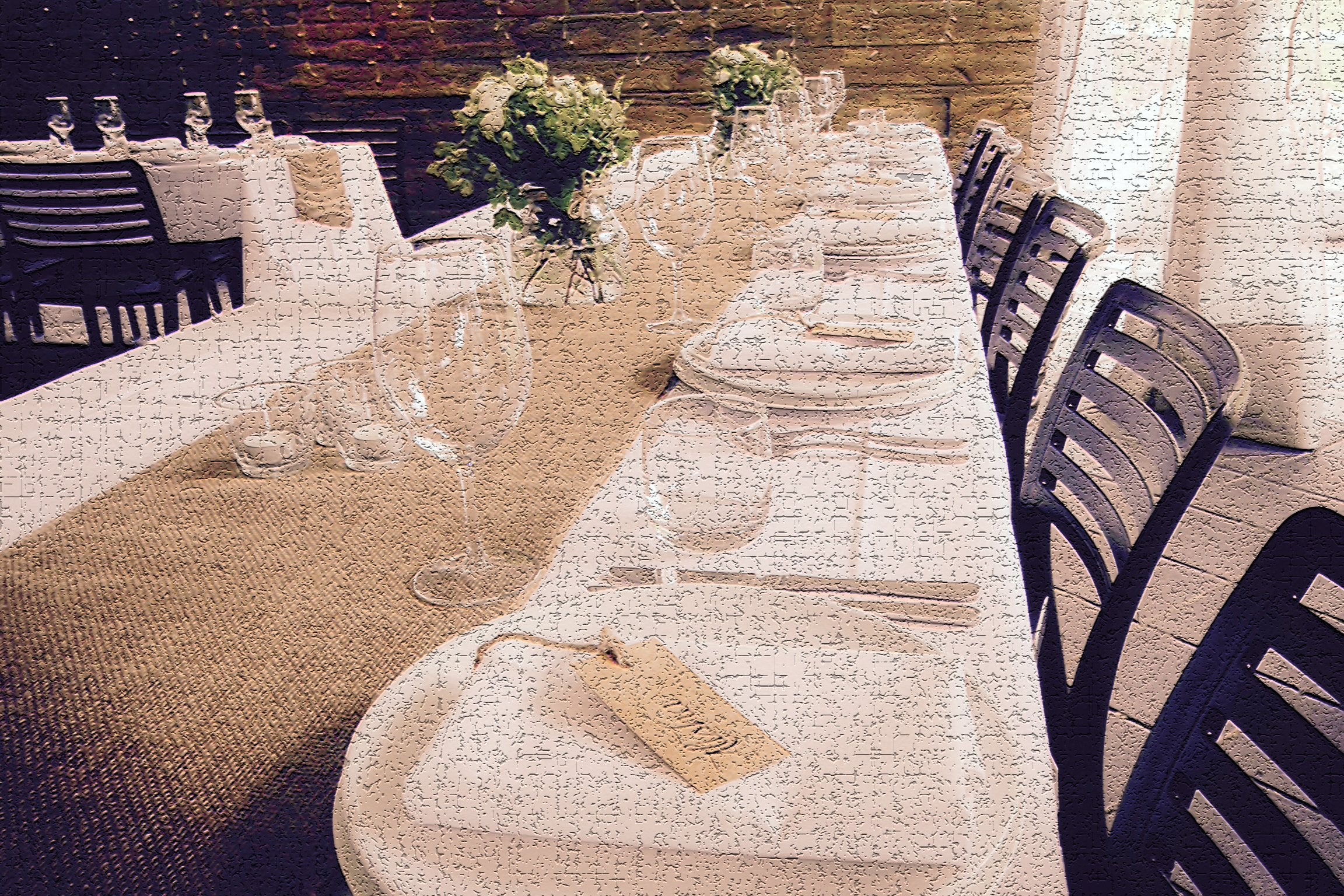 Long dining table arranged for a hospitality event