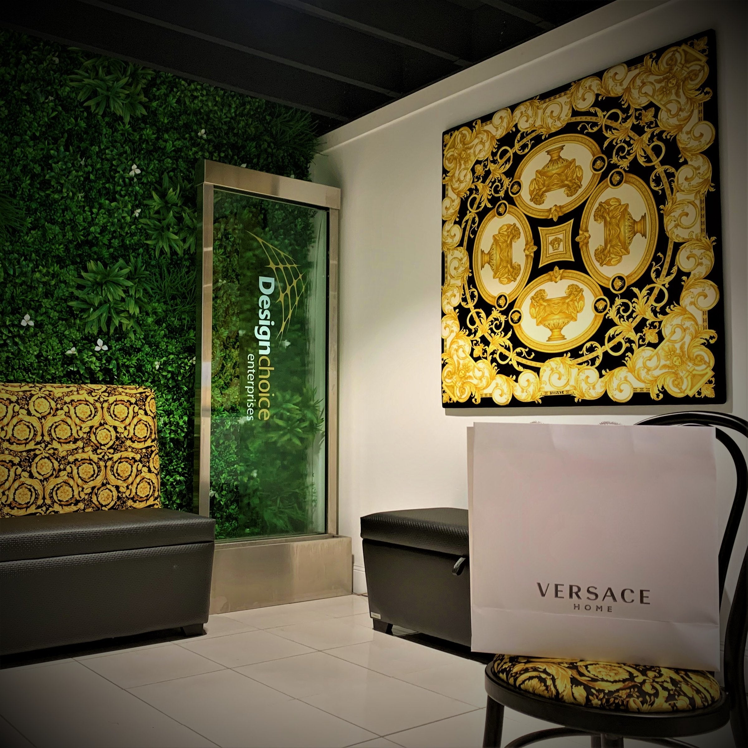 Green living wall, custom upholstery and furniture detail in a hospitality interior